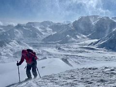 06B Jerome Ryan fights the wind on the final 10m to the summit of Yuhin Peak 5100m near Ak-Sai Travel Lenin Peak Camp 1 4400m